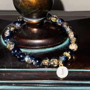 Beautiful Blue Glass beaded bracelet w/charm
